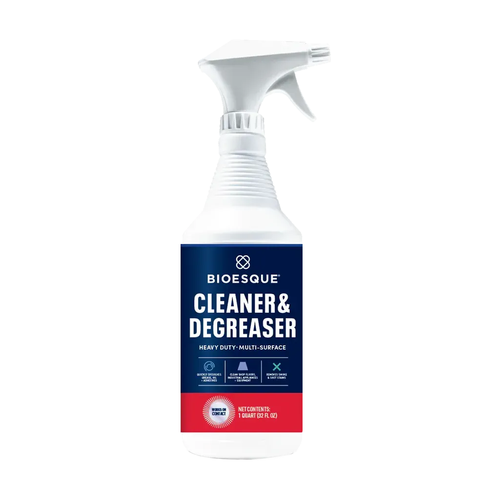 Bioesque Cleaner & Degreaser spray bottle. White bottle with blue and red label.