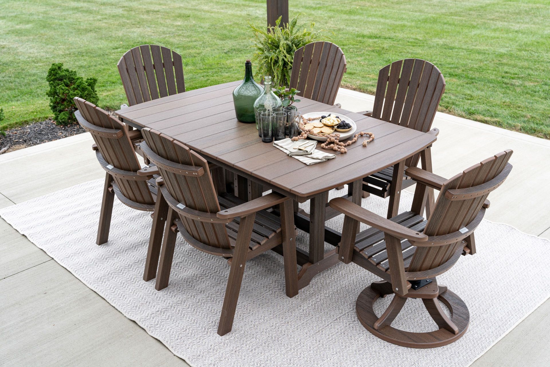 Comfo-Back chairs with Garden Classic 44-by-72-inch recycled plastic patio dining table on a patio in Lewisburg, Pennsylvania.