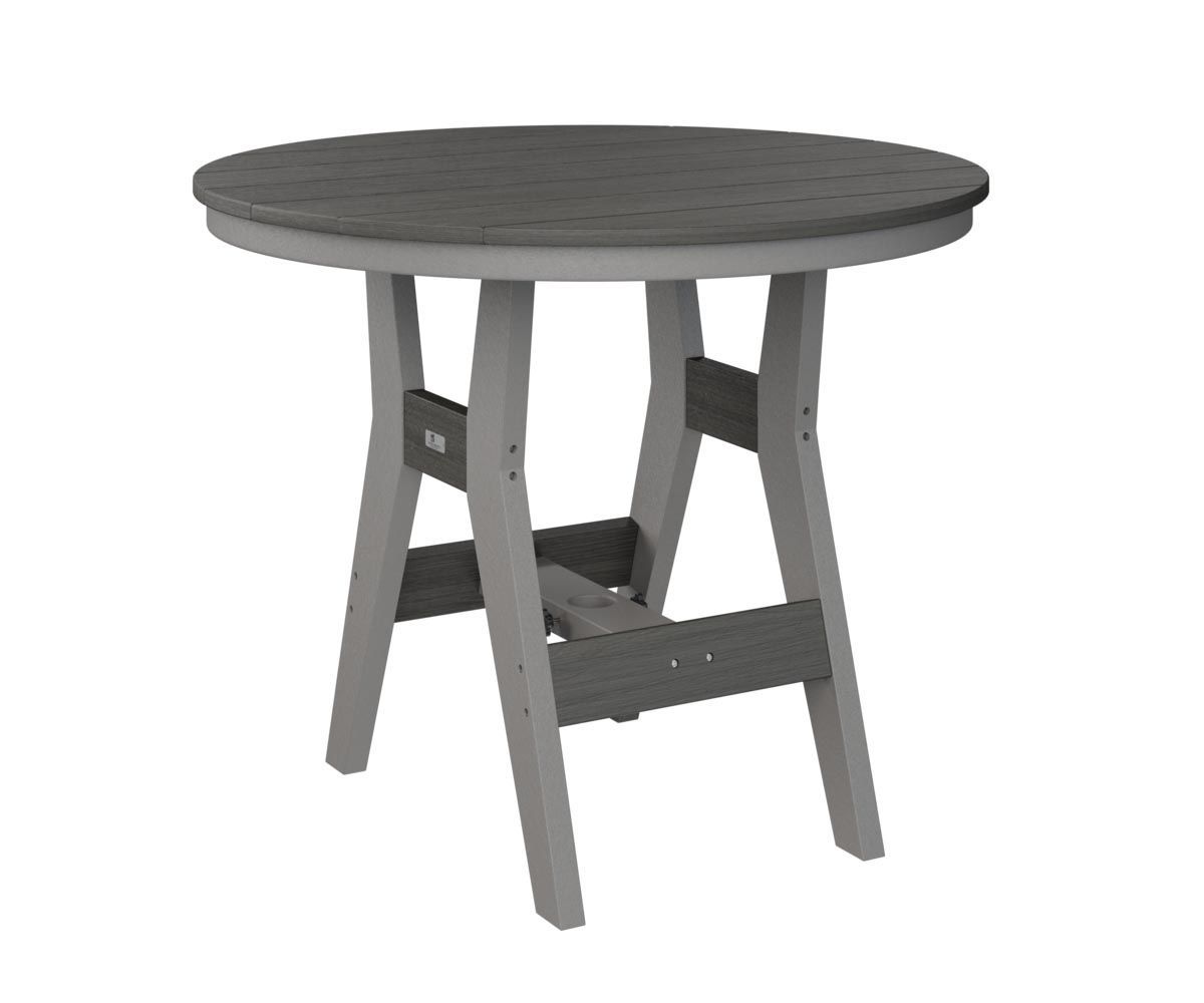 Harbor 38-inch round outdoor dining table made from recycled plastic.