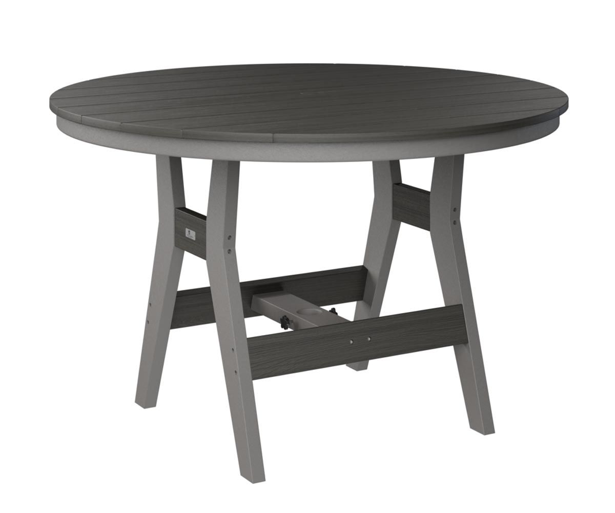 Harbor 48-inch round patio dining table crafted from recycled plastic.