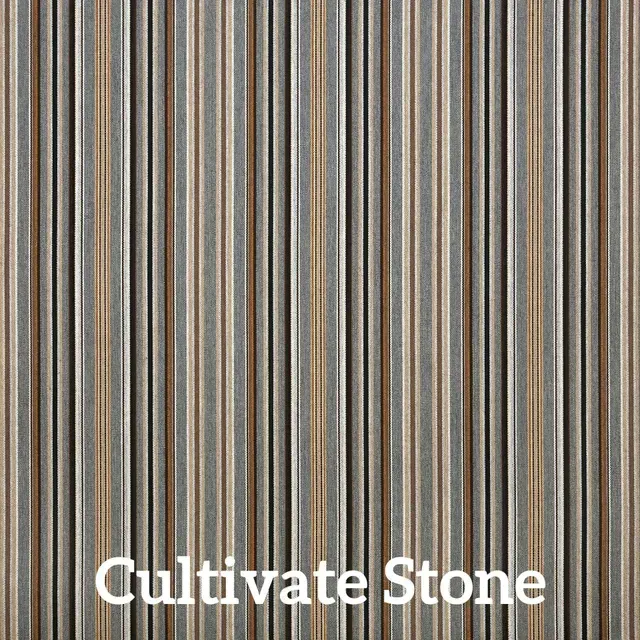 Vertical striped stone wall in shades of gray, brown, and tan.