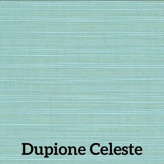 Textured, blue-green fabric with horizontal light blue stripes; labeled