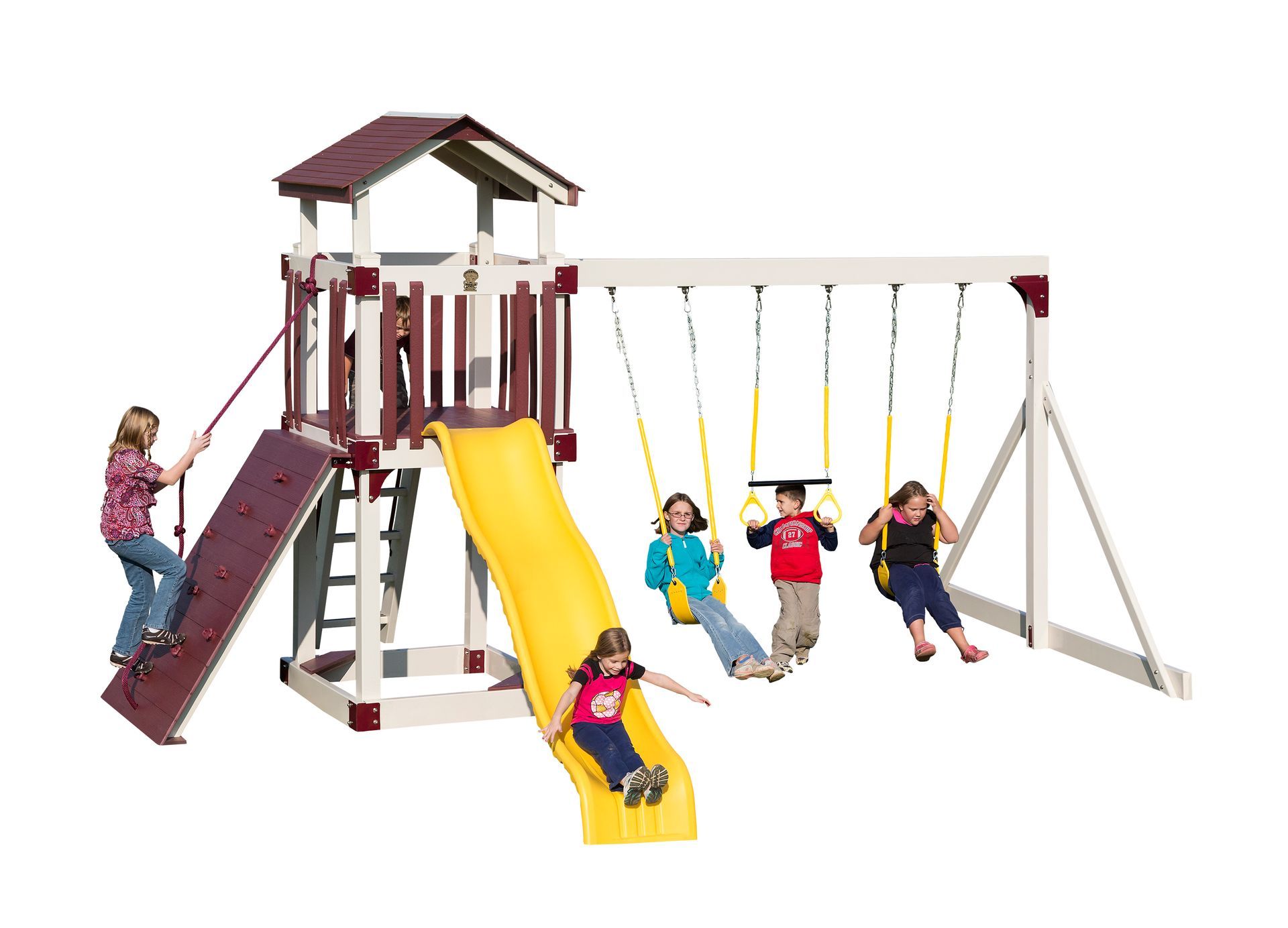 Children playing on a wooden swing set with a slide and climbing wall.