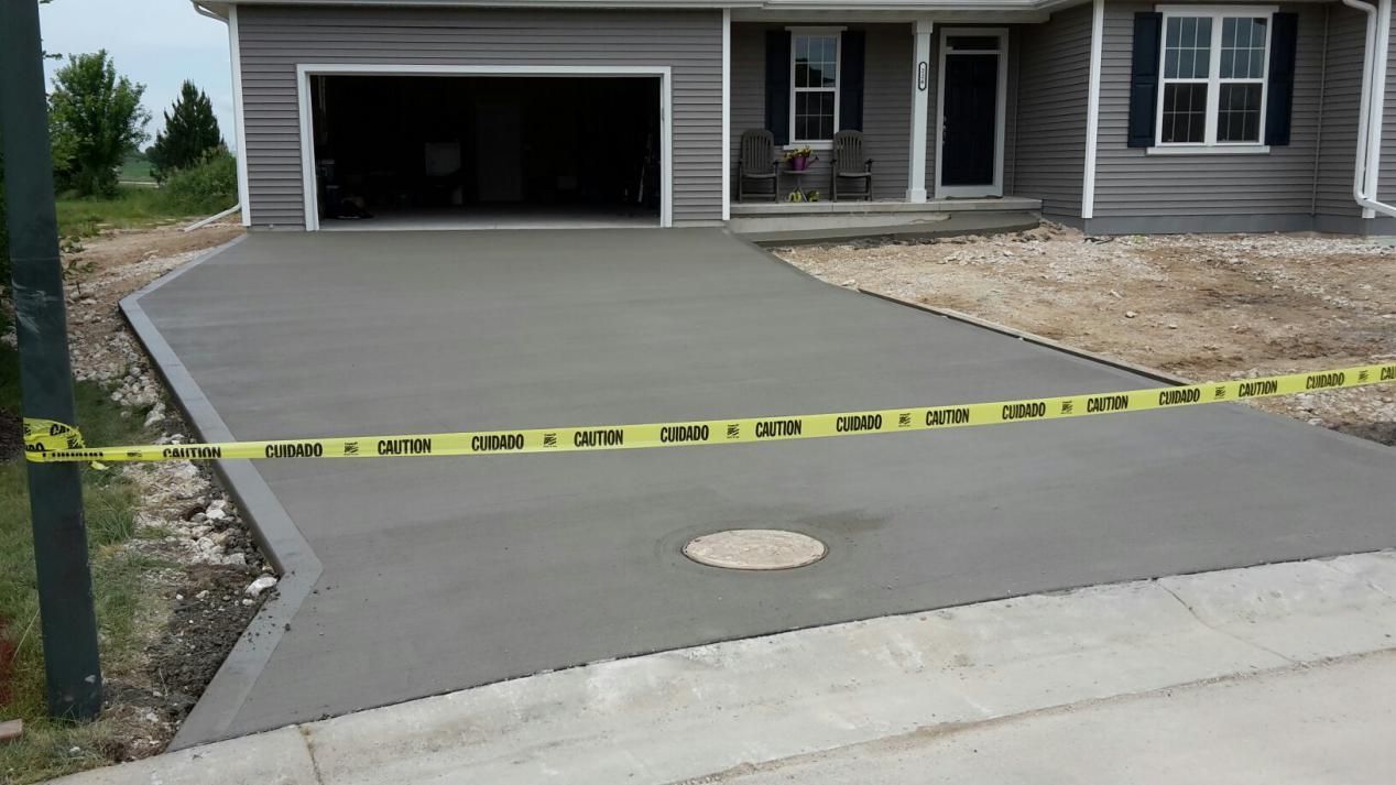 a concrete driveway is newly built
