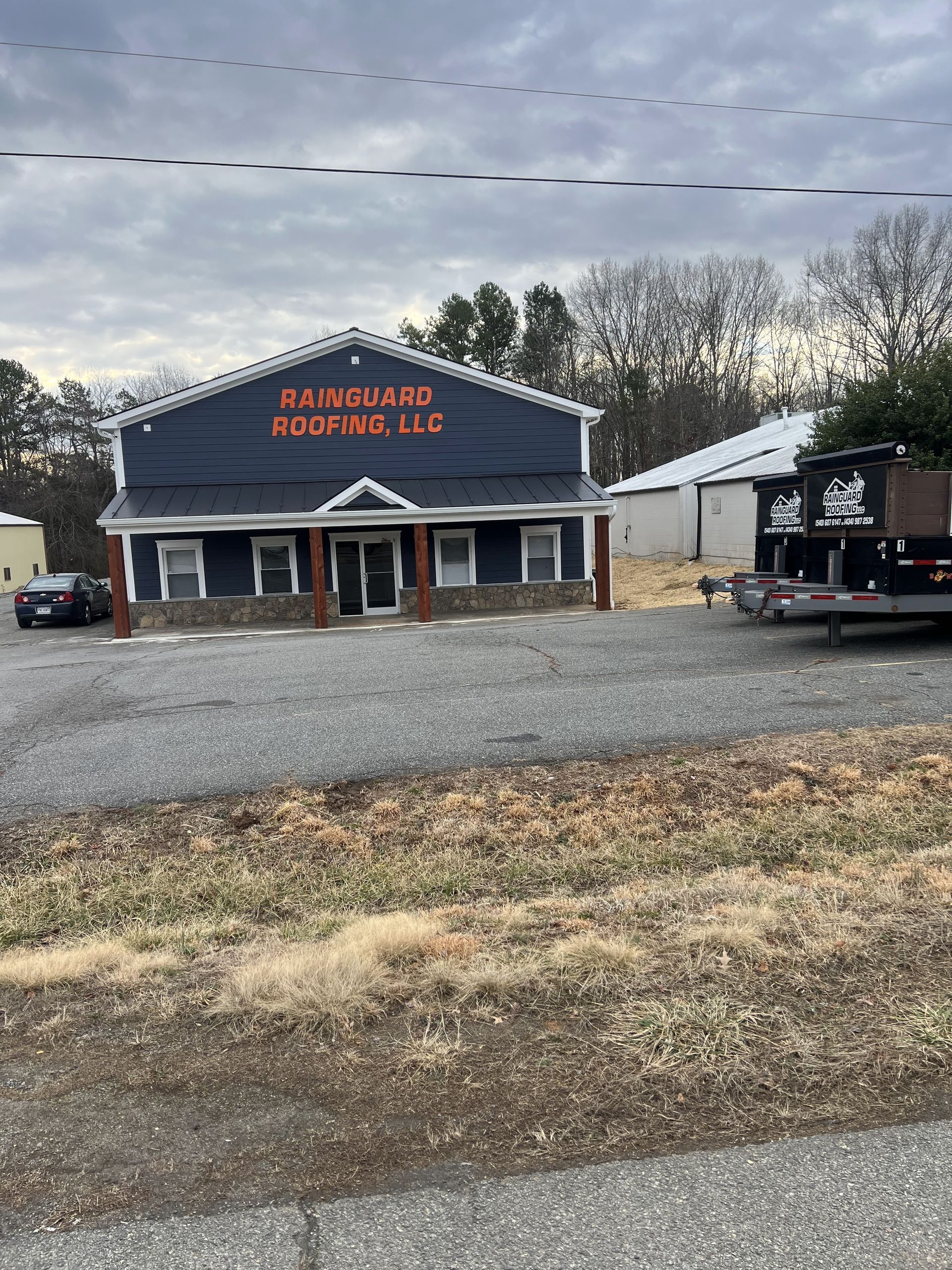 A large building with a truck parked in front of it.