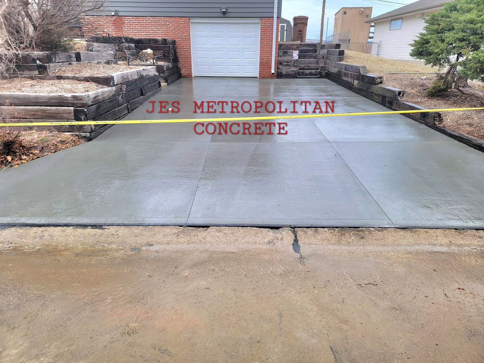 A concrete driveway is being built by jes metropolitan concrete