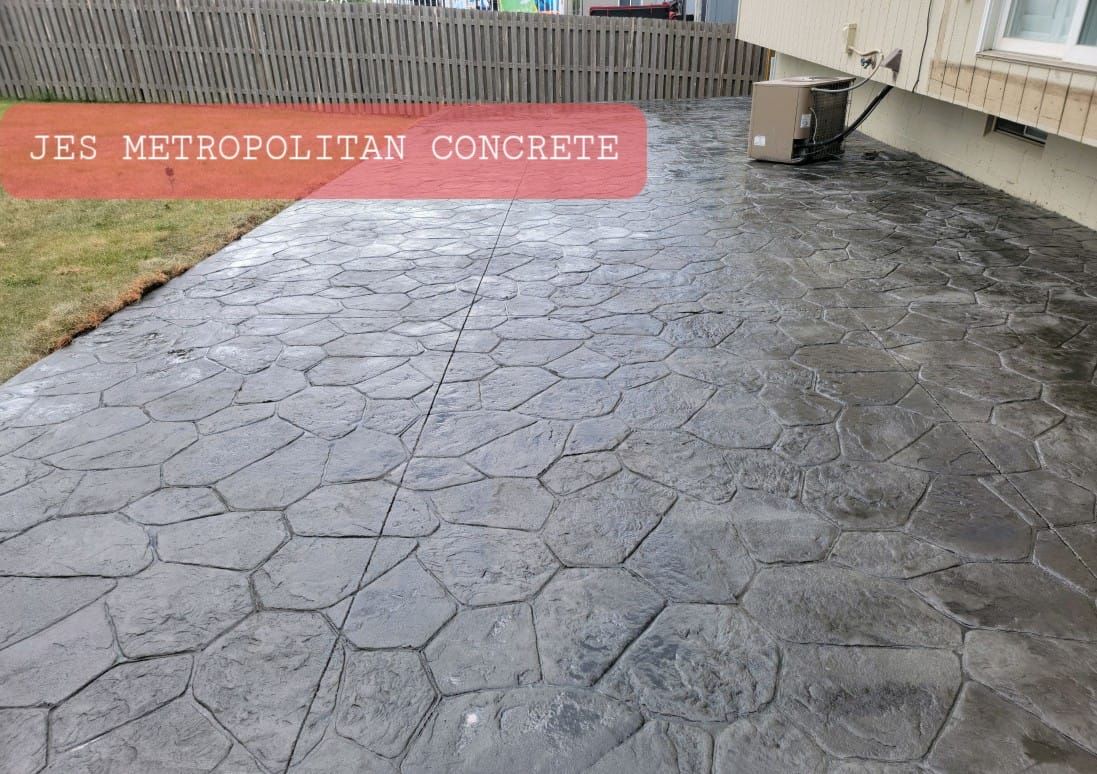 A concrete walkway in front of a house