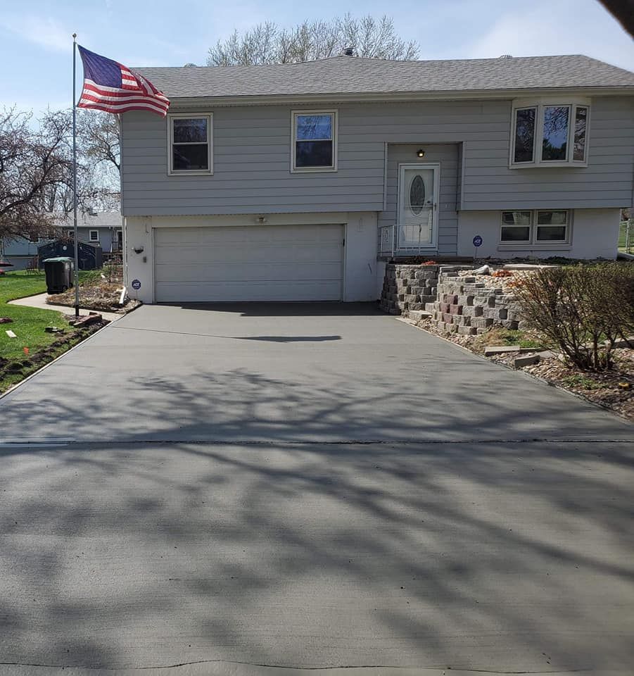 A house with an american flag in front of it