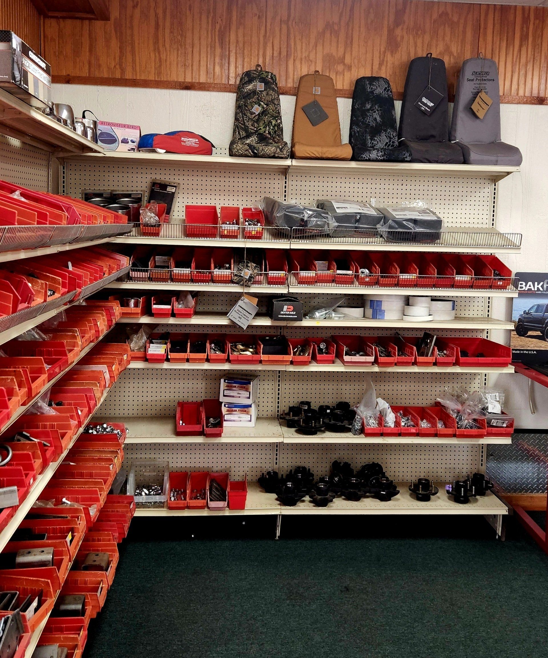 A store filled with lots of red bins and shelves