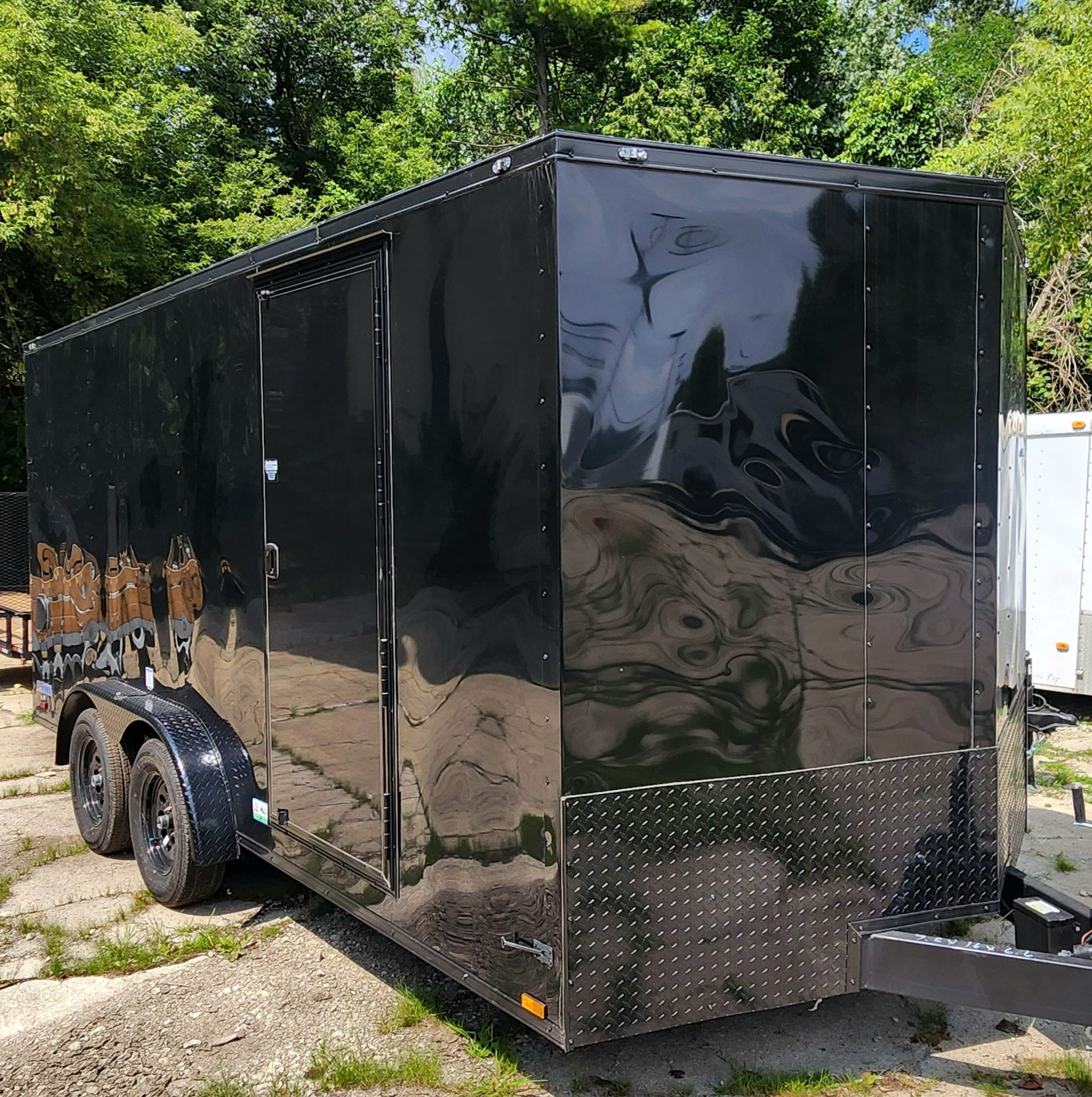 long, black enclosed trailer