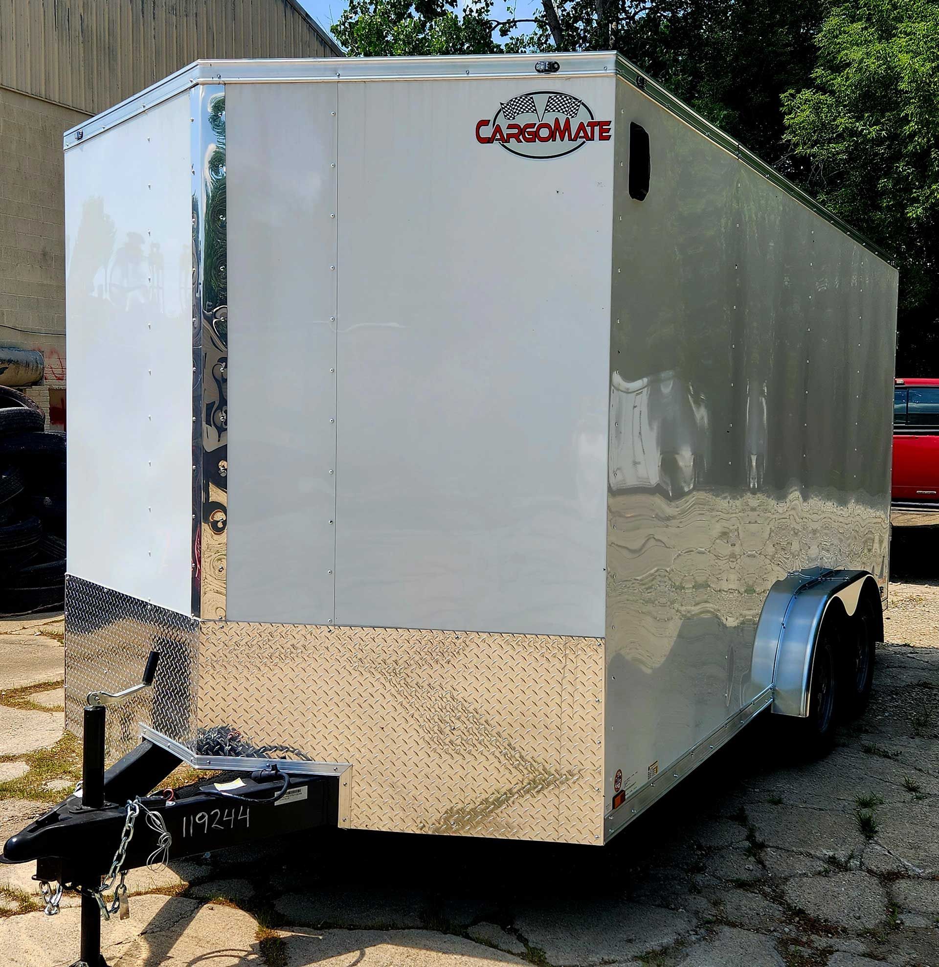enclosed white Cargo Mate trailer