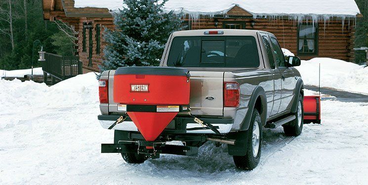 Pickup truck with salt spreader equipment