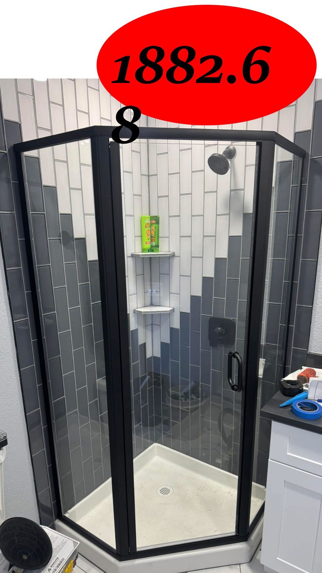 Black framed shower enclosure with angled walls