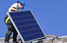 Man Installing solar panels