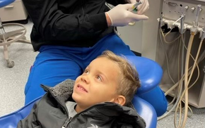 Kid having dental check up