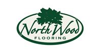 Logo for North Wood Flooring with a green oval, a tree and text.