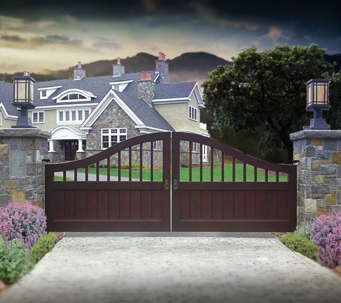 A large house with a wooden gate in front of it