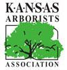Logo for the Kansas Arborists Association featuring green tree foliage above the text.