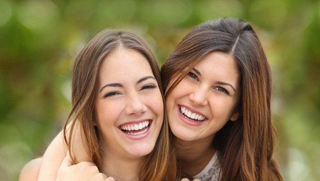 Happy ladies with beautiful smile