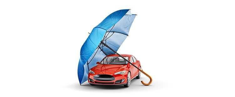 a red car is covered by a blue umbrella .