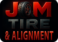 JOM Tire & Alignment logo with red and grey text on a black background; tire in the "O".