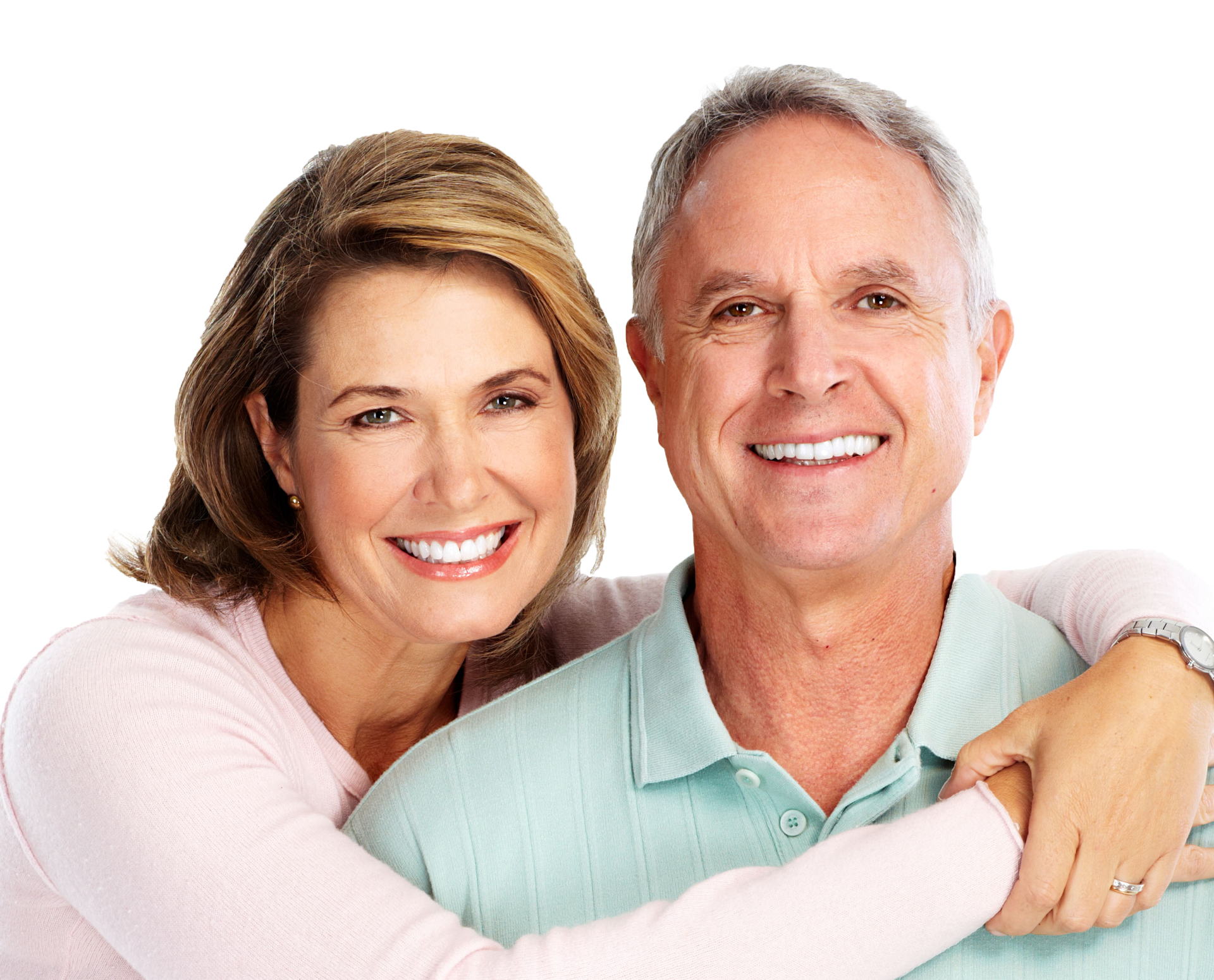 A man and a woman are hugging and smiling for the camera