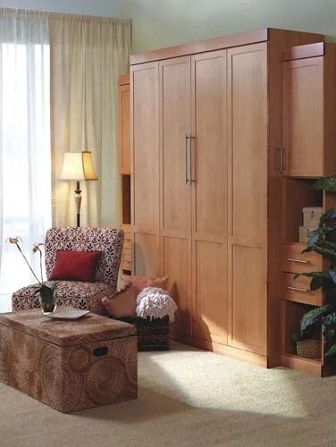 A living room with wooden cabinets , a chair and a coffee table