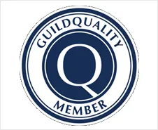 GuildQuality Member badge, blue and white, with a stylized 