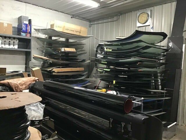A warehouse filled with lots of car parts and boxes