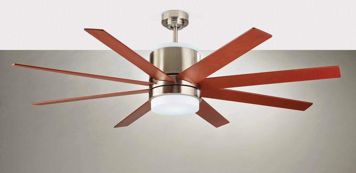 A ceiling fan with red blades is hanging from the ceiling