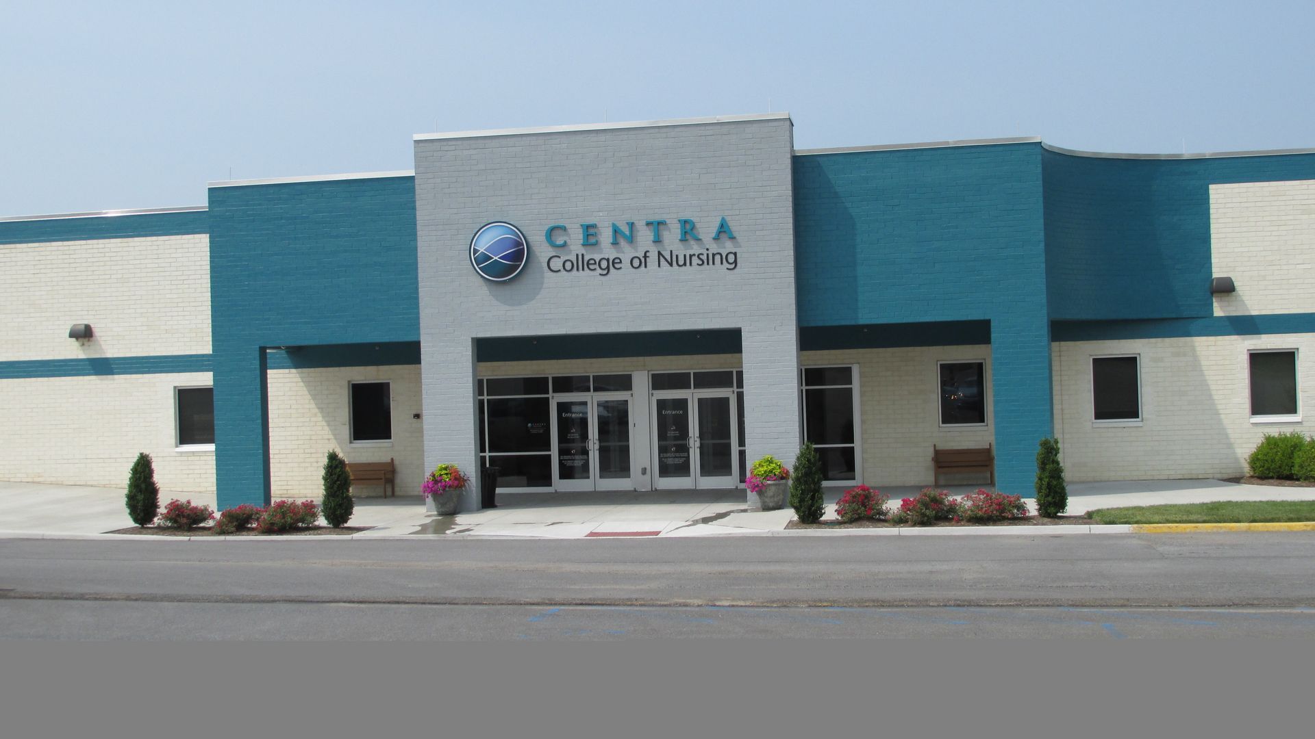 A blue and white building that says centra college of nursing