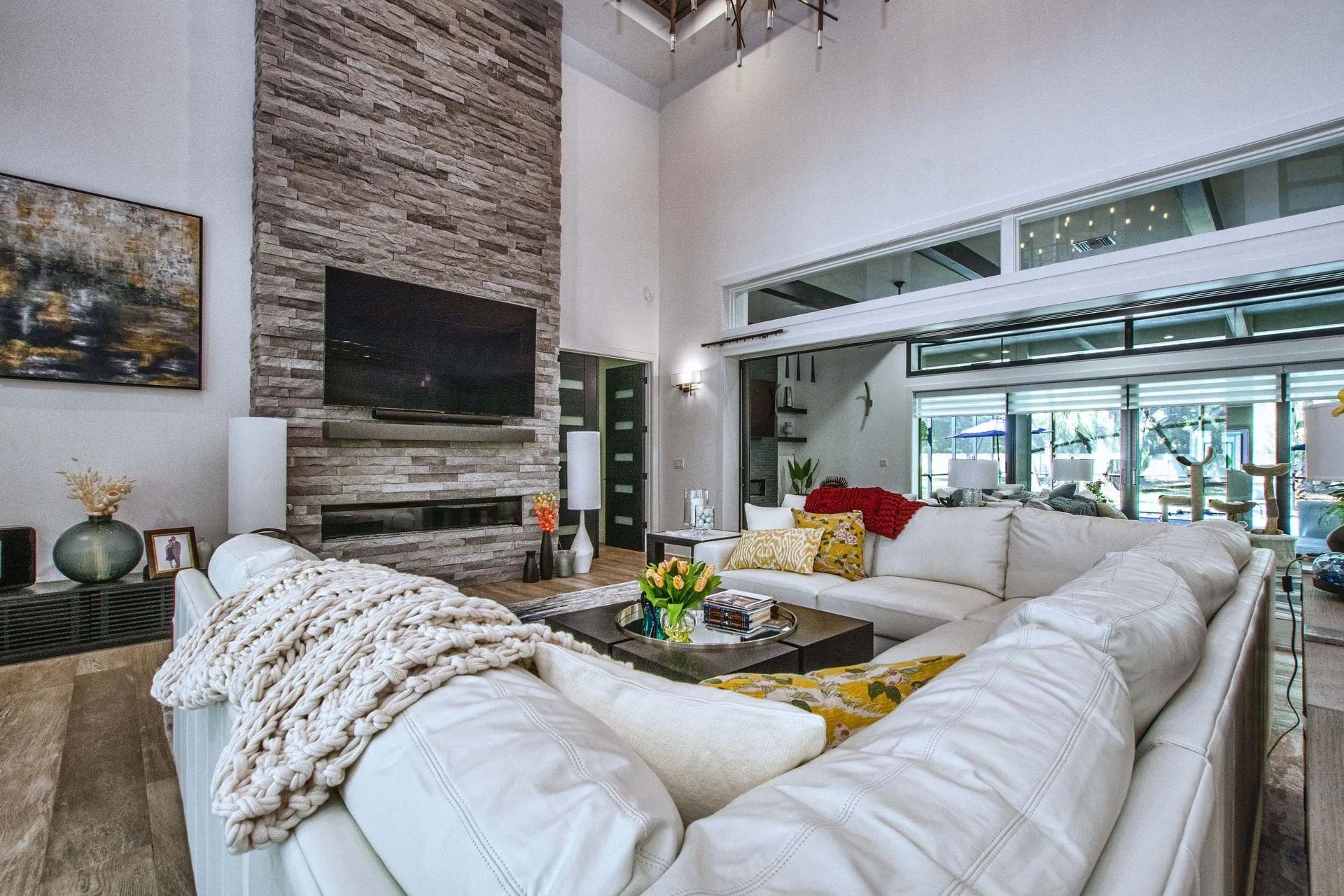 A living room filled with furniture and a flat screen tv.