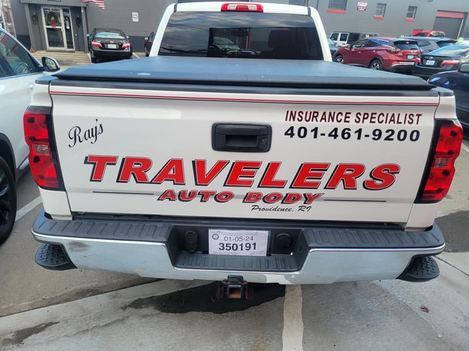 Ray's Travelers Auto Body Service Van