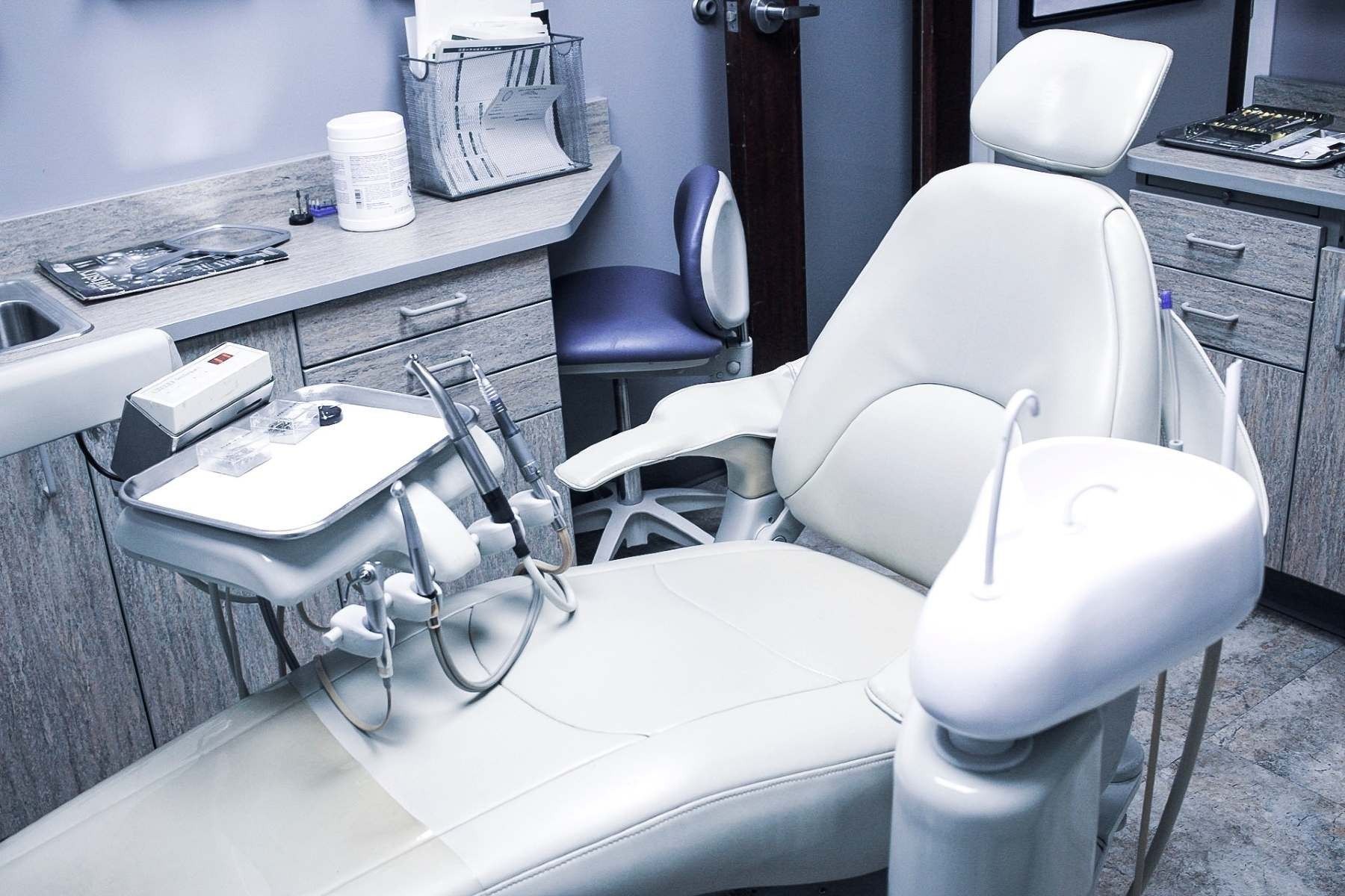 An empty dental chair in a dental office