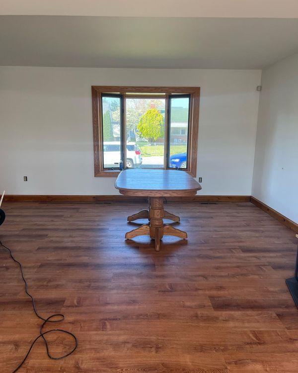A set of stairs with wooden steps and a wooden railing.
