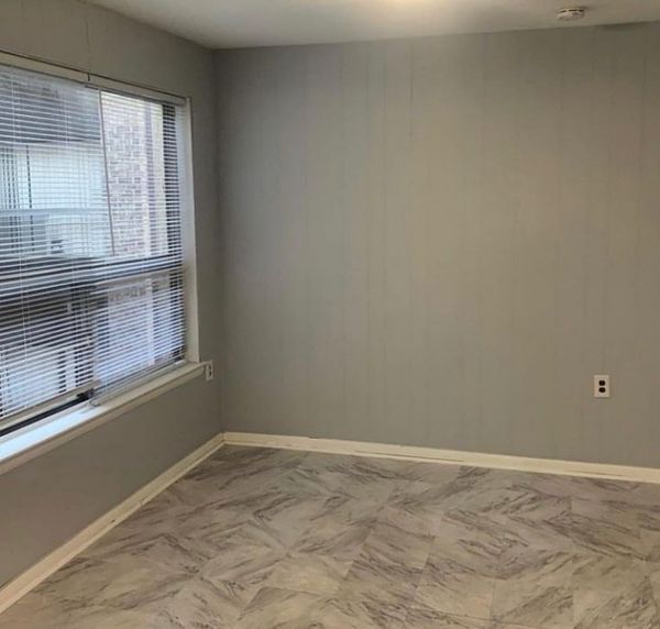 A warehouse filled with lots of tiles and marbles.