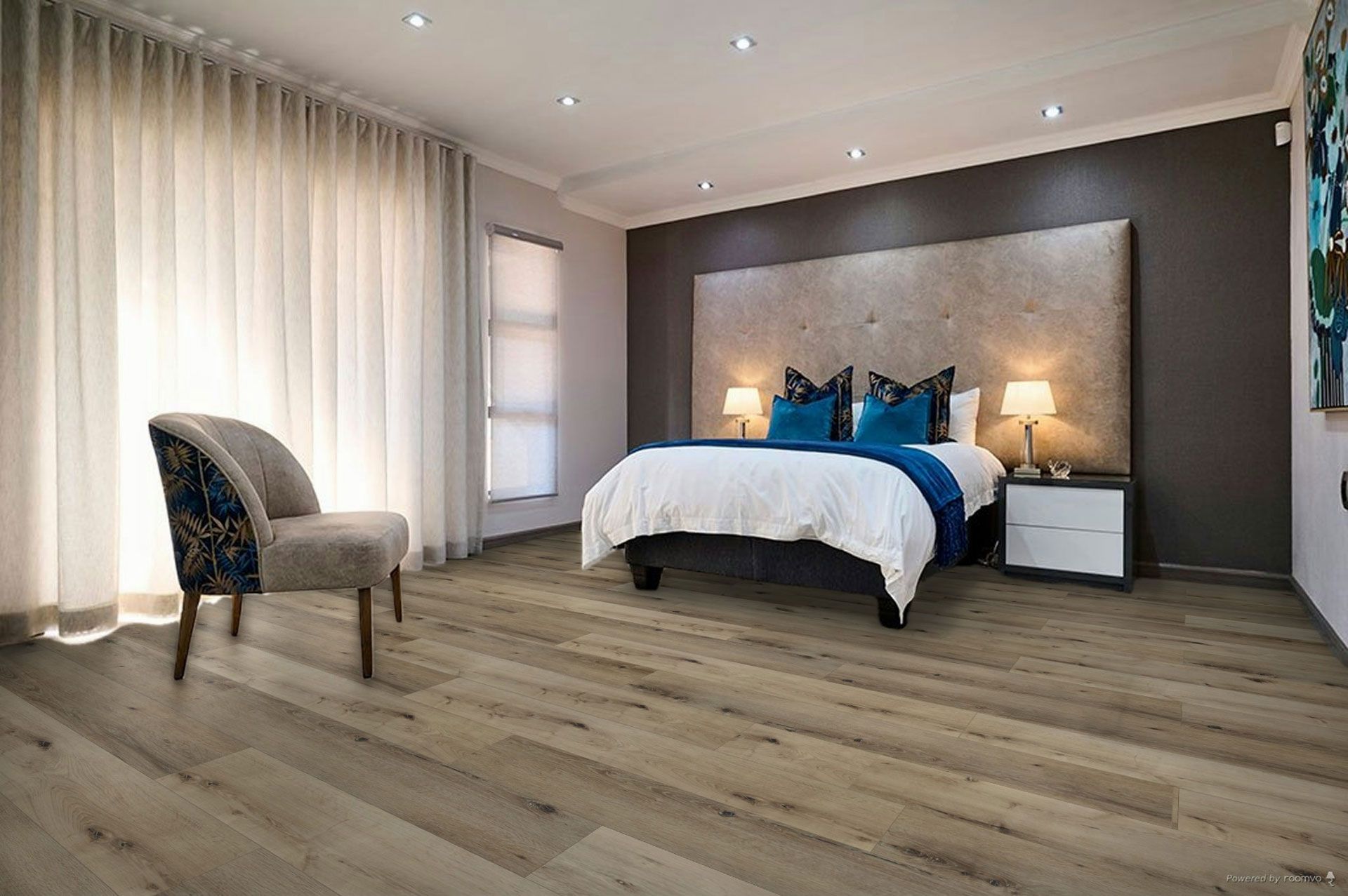 A bedroom with hardwood floors , a bed , a chair and a window.