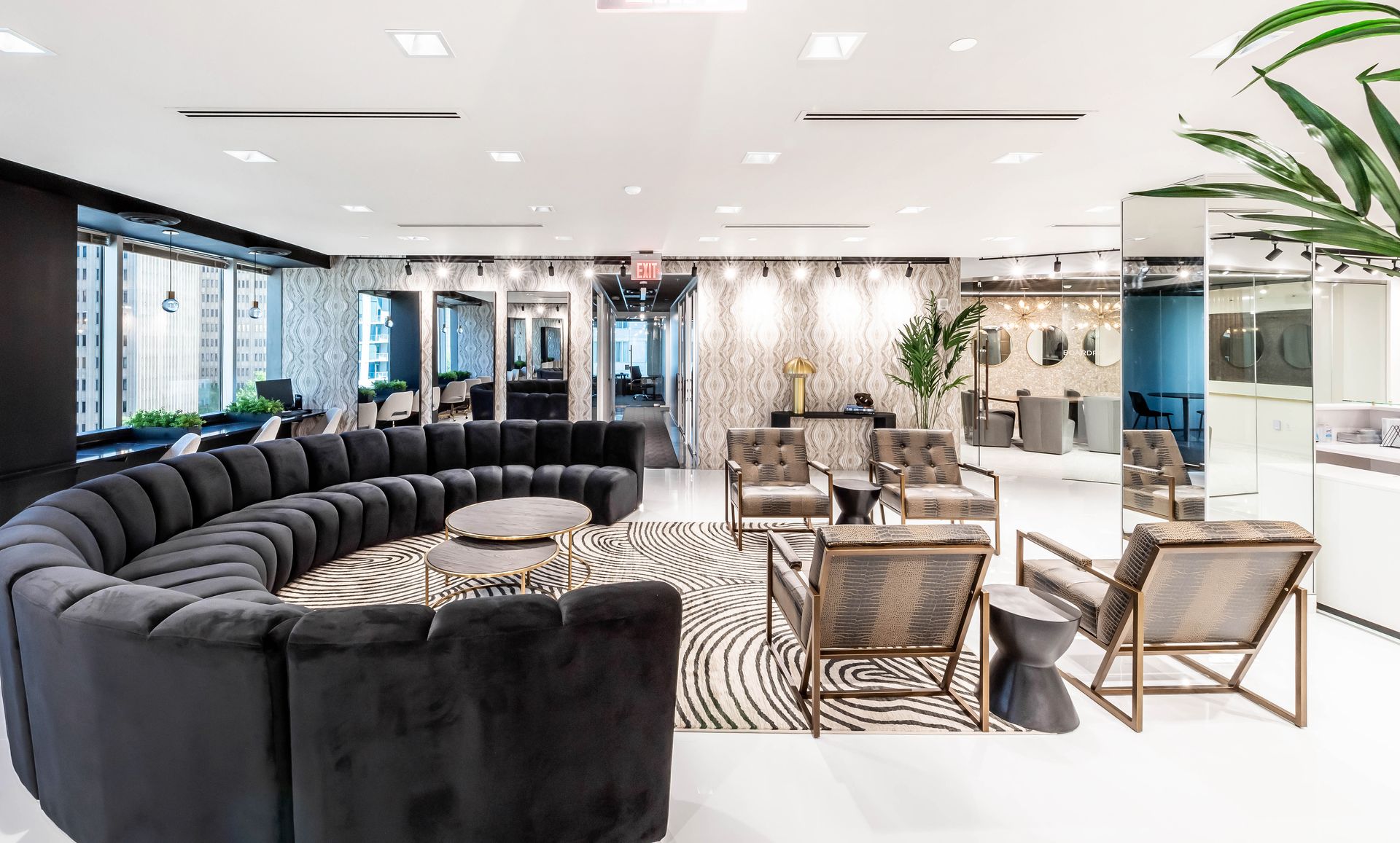 There is a large couch in the middle of the room.