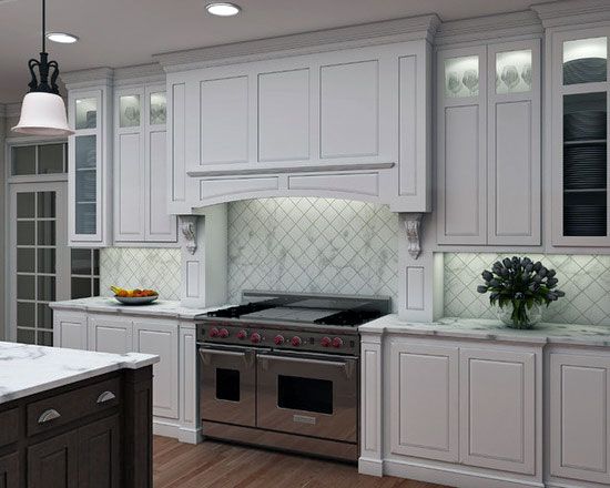 A modern kitchen featuring white cabinets, a professional-style range, and a marble tile backsplash.