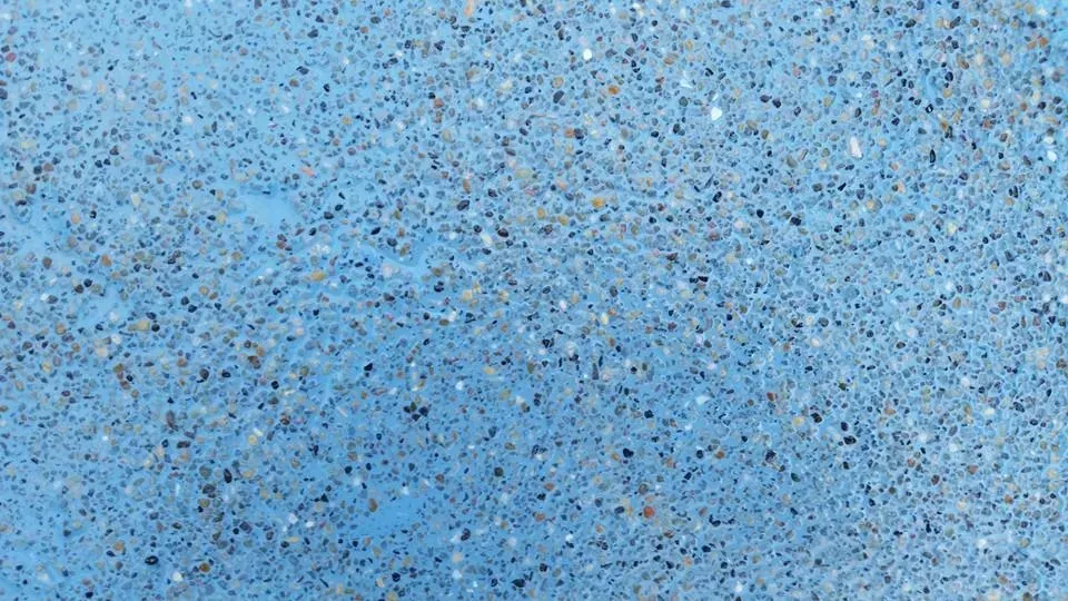 Blue speckled surface.