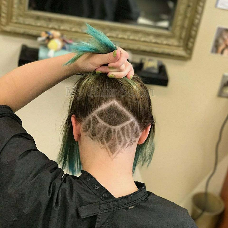 A woman with a shaved design in her hair