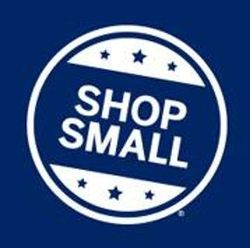 Shop Small logo in white on a blue background. The logo is a circle with white text and stars.