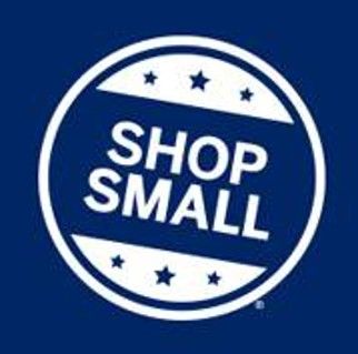 Shop Small logo in white on a blue background. The logo is a circle with white text and stars.