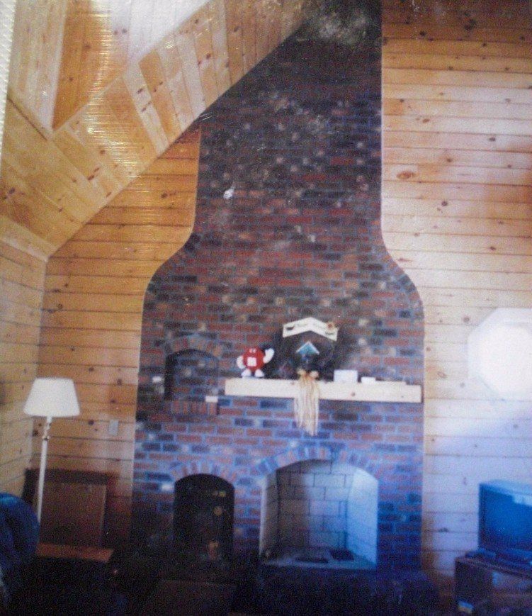 tall fireplace with chimney