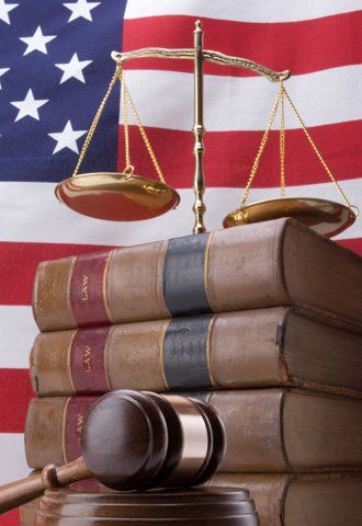 Scale, law books and gavel
