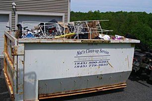 Dumpster full of residential junk