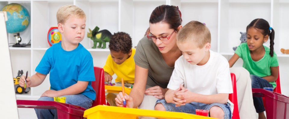 Teacher teaching kids