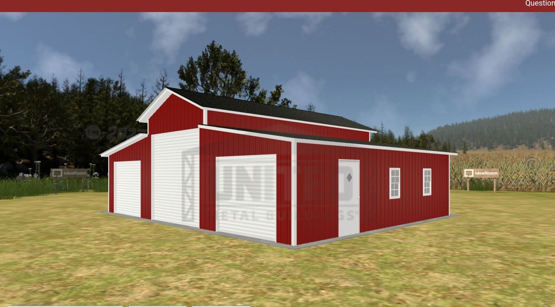 Red barn-style building with white trim and garage doors in a grassy field