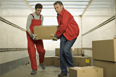 Two guys holding a box