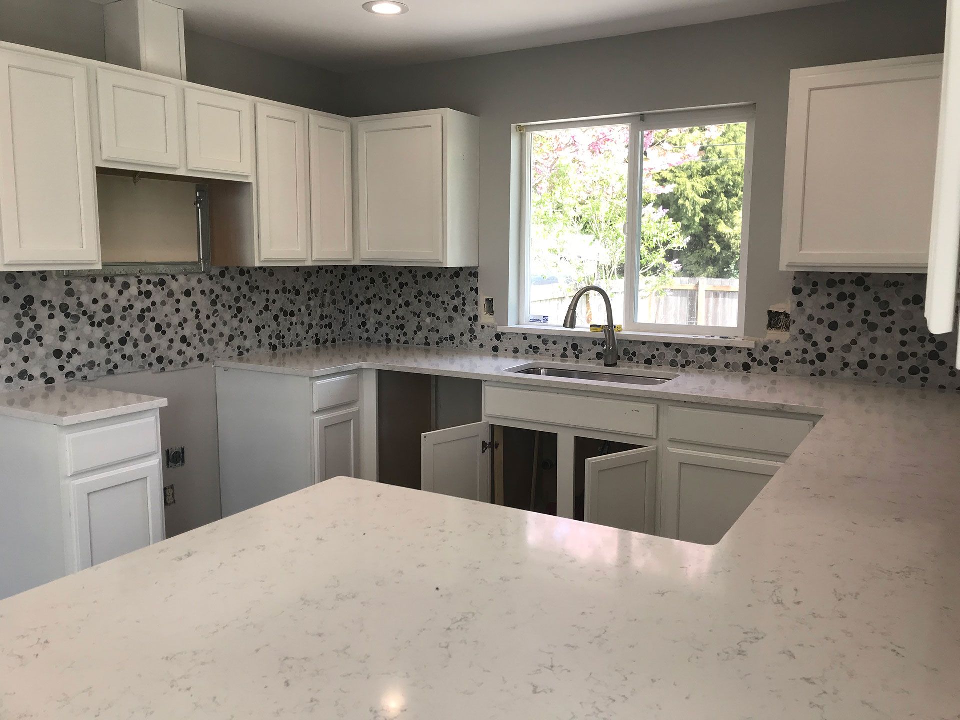 white and marble kitchen remodel
